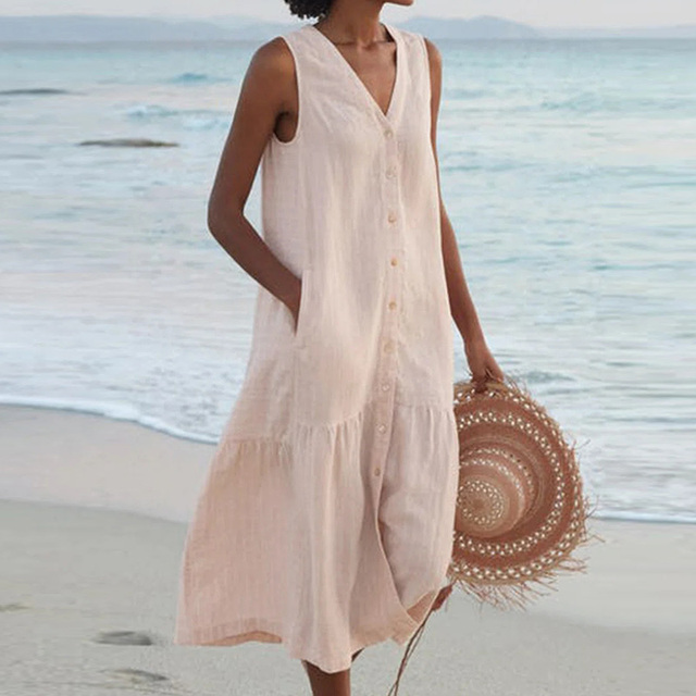 Abito estivo midi da donna senza maniche, con scollo a V e bottoni. Look casual chic e vestibilità comoda.