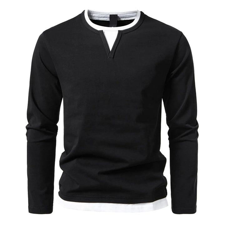 Top uomo nero a maniche lunghe, polo versatile con effetto a strati, ideale per abbigliamento casual chic.