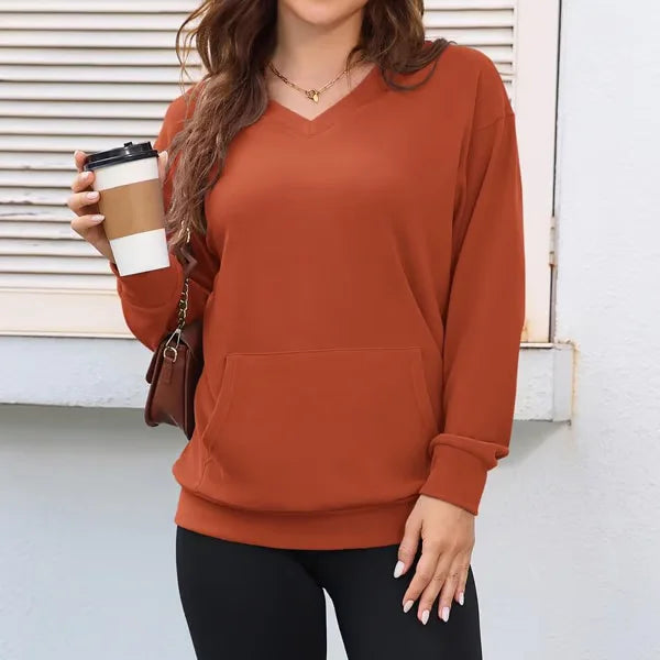 Maglione pullover donna casual con tasca frontale, ideale per comfort quotidiano e stile rilassato.