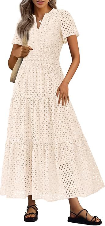 Abito da spiaggia donna, stile fluido, scollo a V e maniche corte. Eleganza casual per l'estate.
