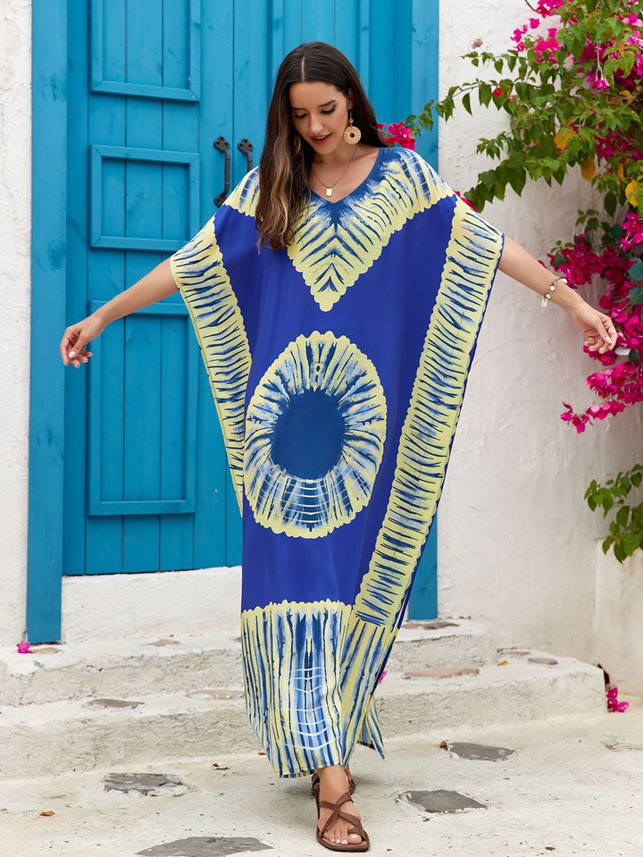 Abito lungo stampato donna con scollo a V, design elegante per le serate estive.
