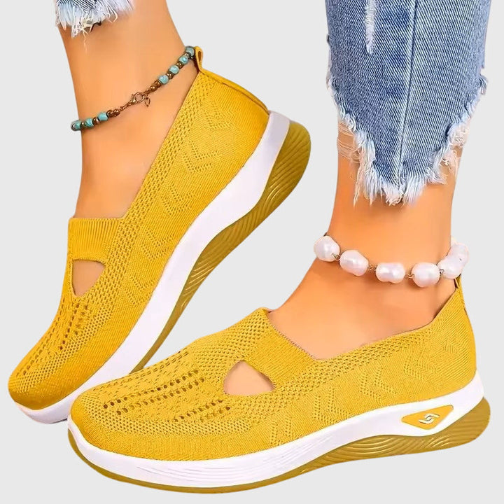 Assortimento di sneakers slip on donna traspiranti in vari colori, con suola spessa confortevole.