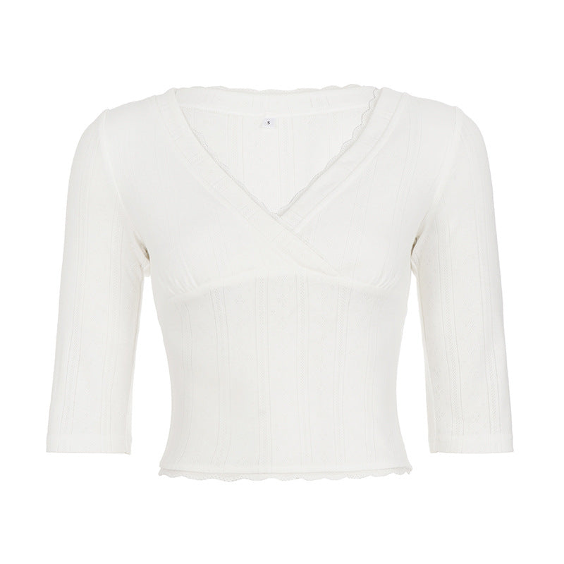 Top donna aderente tinta unita, abbigliamento femminile essenziale per un'eleganza quotidiana e un look casual.