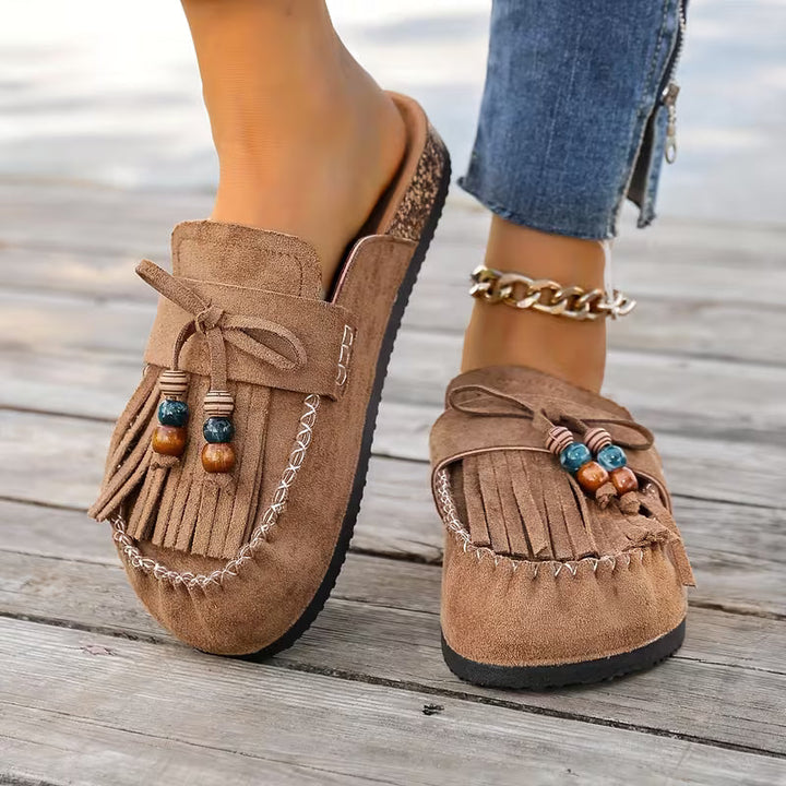 Comodi sandali estivi donna stile boho con nappe per un comfort e un look casual alla moda.