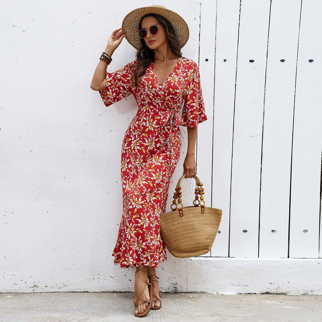 Abito da donna aderente, design chic con mezze maniche, ideale per serate estive e occasioni.
