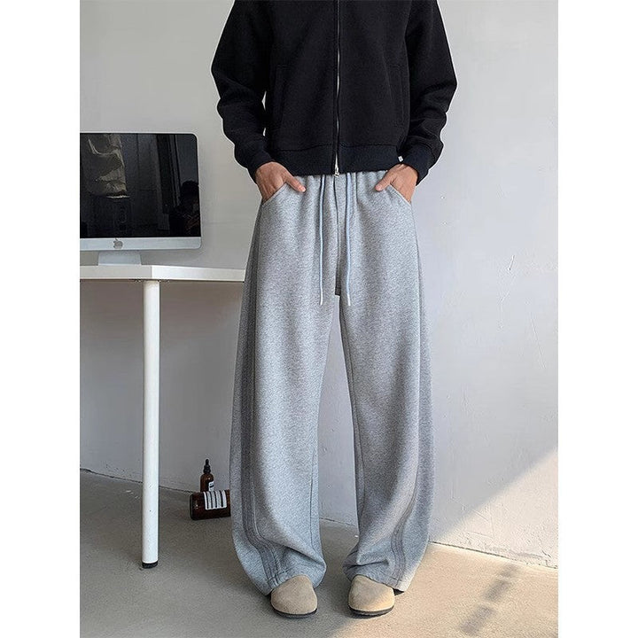 Pantaloni uomo eleganti/casual, gamba dritta, vita media. Stile retrò versatile, perfetti per streetwear.