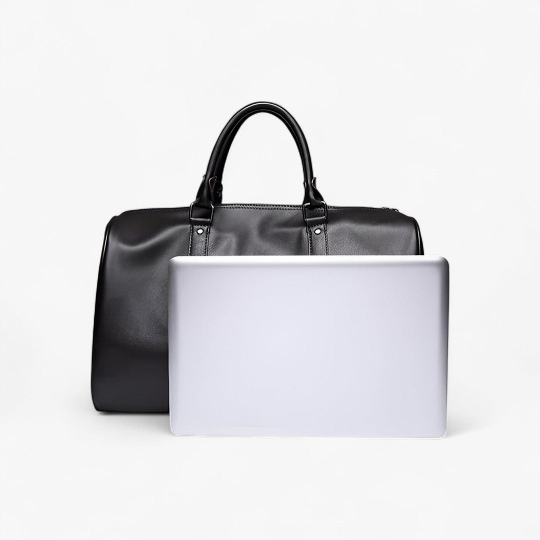 Versatile borsone nero da viaggio e sport per uomo, tracolla removibile, design pratico e moderno.