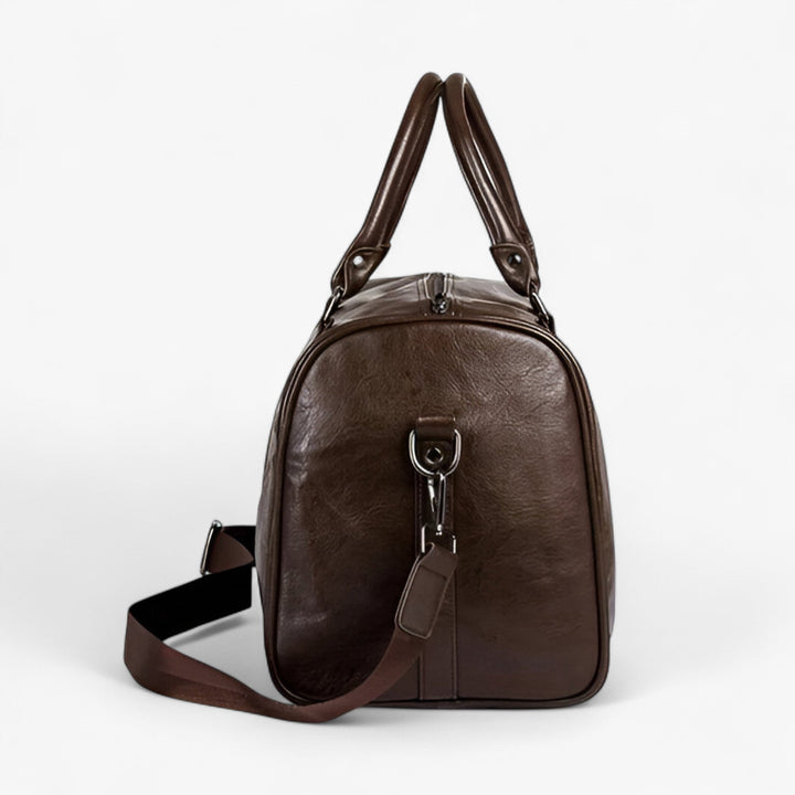 Capiente borsone nero uomo per viaggi o palestra, con tracolla staccabile, manici robusti e tasche.