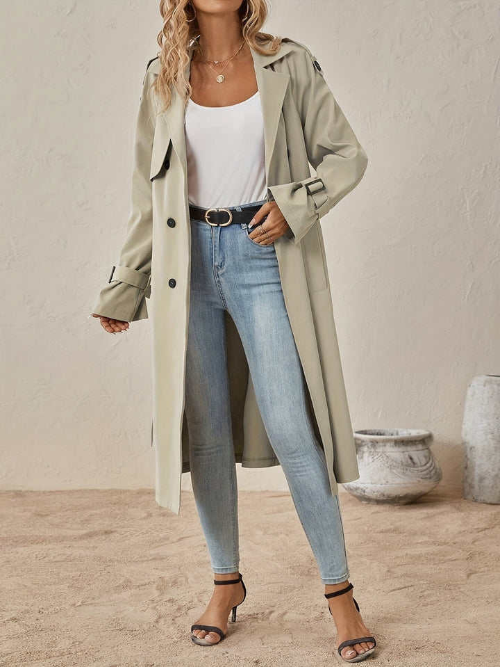 Trench lungo da donna, perfetto per l'eleganza quotidiana. Capo d'abbigliamento versatile primavera/autunno.