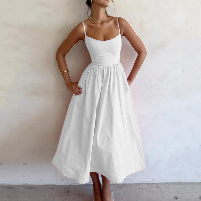 Abito estivo donna midi con spalline sottili e linea A, ideale per un look casual o elegante in tinta unita.