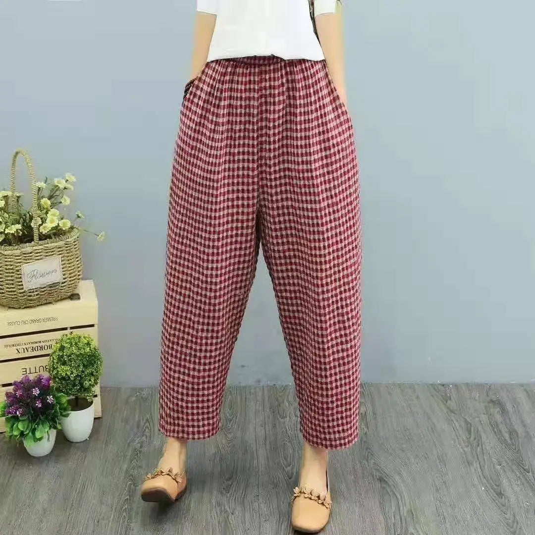 Pantaloni harem donna eleganti a vita alta con stampa a quadri, perfetti per un look casual chic di primavera autunno.