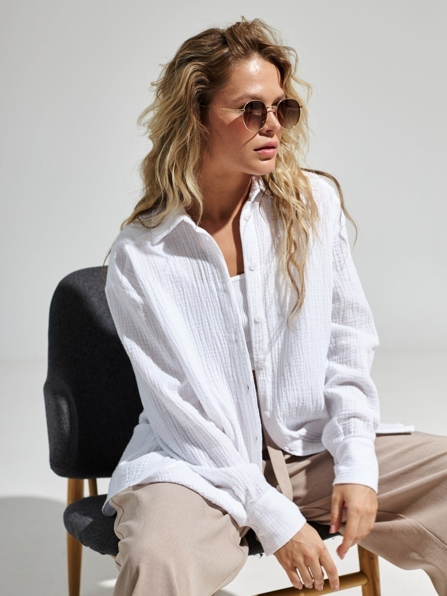 Camicia donna elegante a maniche lunghe, perfetta per look da ufficio o casual chic.