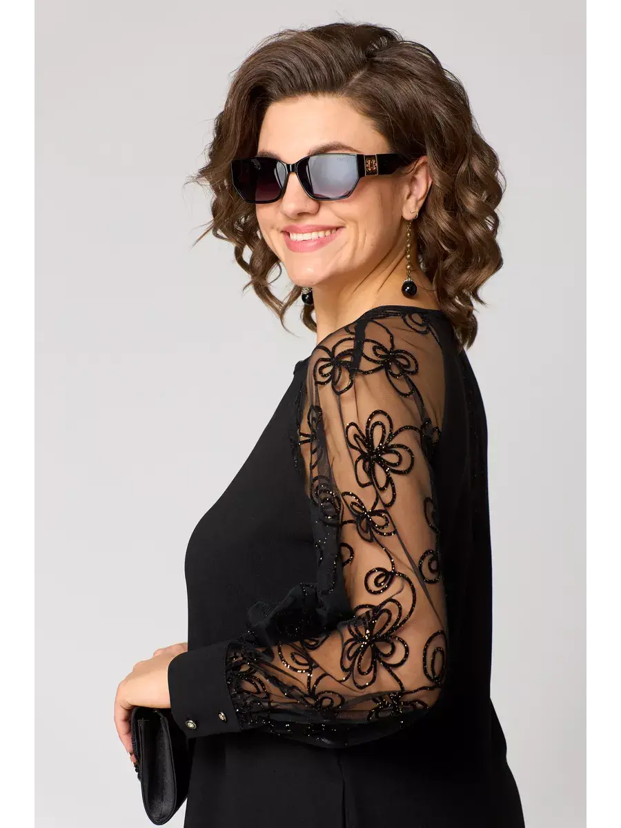 Elegante abito midi nero da donna, taglio svasato, con maniche raffinate, perfetto per eventi serali.
