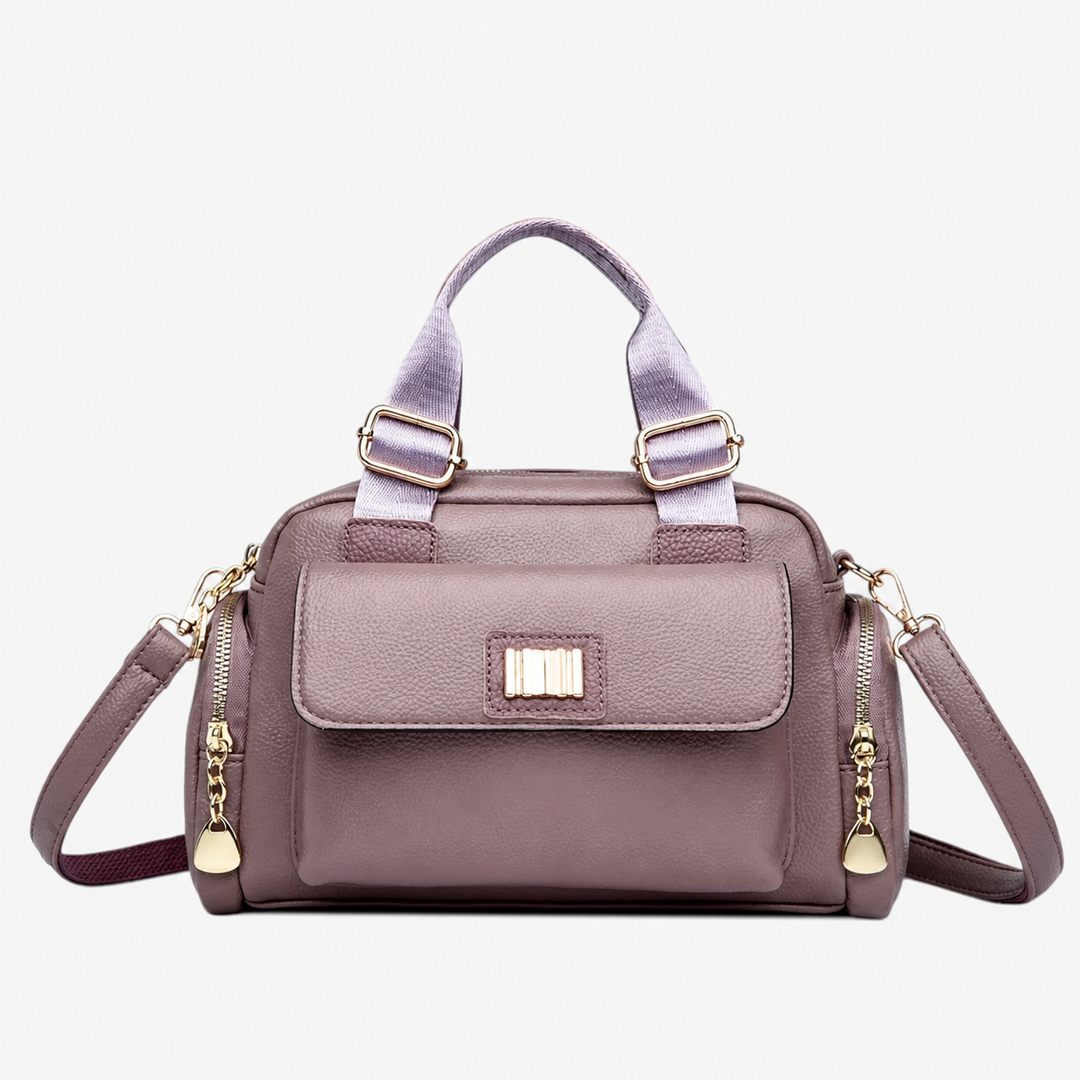 Accessorio moda donna: borsa a mano nera multitasche con tracolla. Elegante e spaziosa, ideale per ogni occasione.