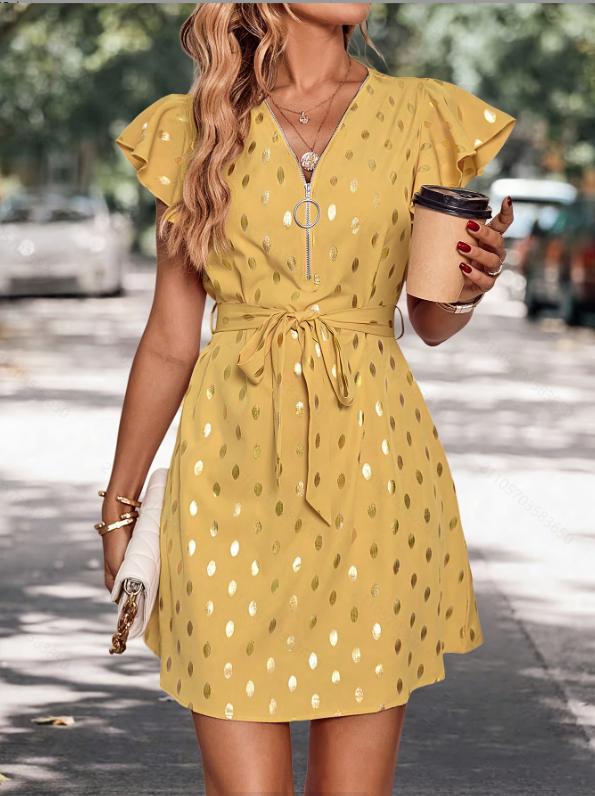 Abito donna primaverile/estivo a pois con maniche lunghe, vita alta e linea ad A, versatile ed elegante.