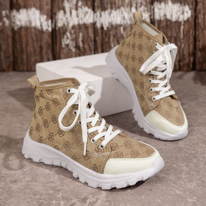 Scarpe stivaletti donna rosa con lacci robusti e suola platform spessa, per uno stile originale e comodo.