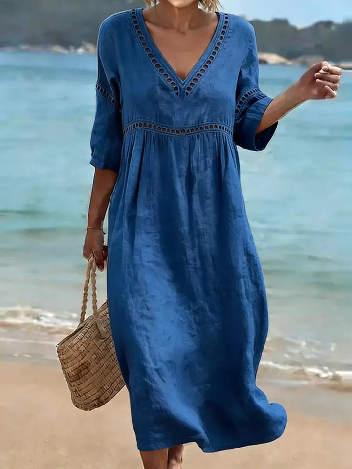 Vestito estivo in cotone con scollo a V, comodo e traspirante, ideale per la moda donna casual.
