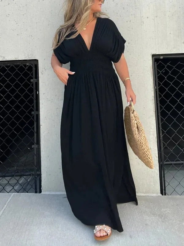 Maxi abito estivo donna crema, scollo a V e spacco, per un look chic e sofisticato.