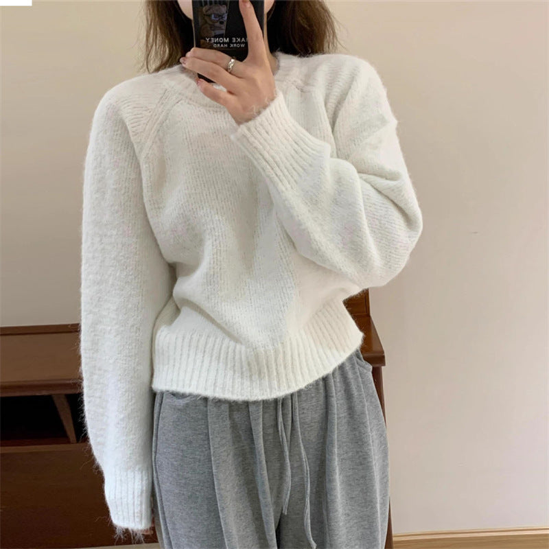Pullover donna comodo a maniche lunghe, vestibilità ampia. Maglione casual con scollo rotondo per outfit quotidiani.