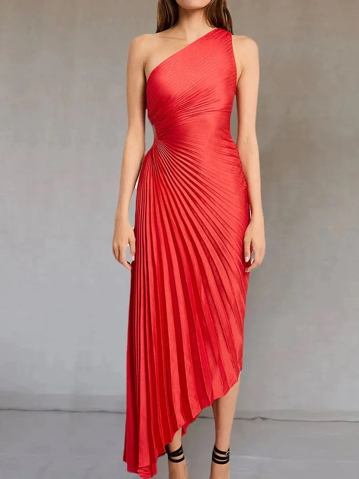 Abito cerimonia donna, monospalla e plissettato, per eleganza e grazia impeccabili.