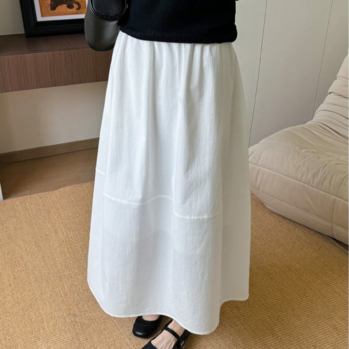 Gonna estiva a ombrello da donna, taglio lungo e vita alta, ideale per un look elegante e versatile in estate.