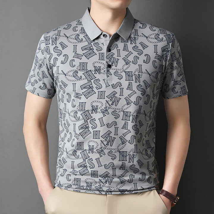 Polo estiva da uomo con stampa floreale blu e verde, taglio asimmetrico, moda casual.