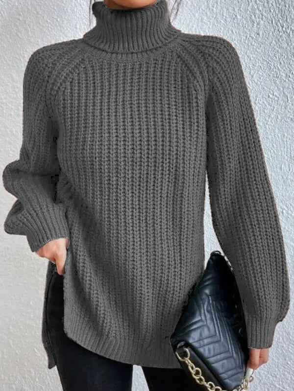 Maglione dolcevita donna in maglia fine, design con maniche raglan, ideale per il comfort invernale.