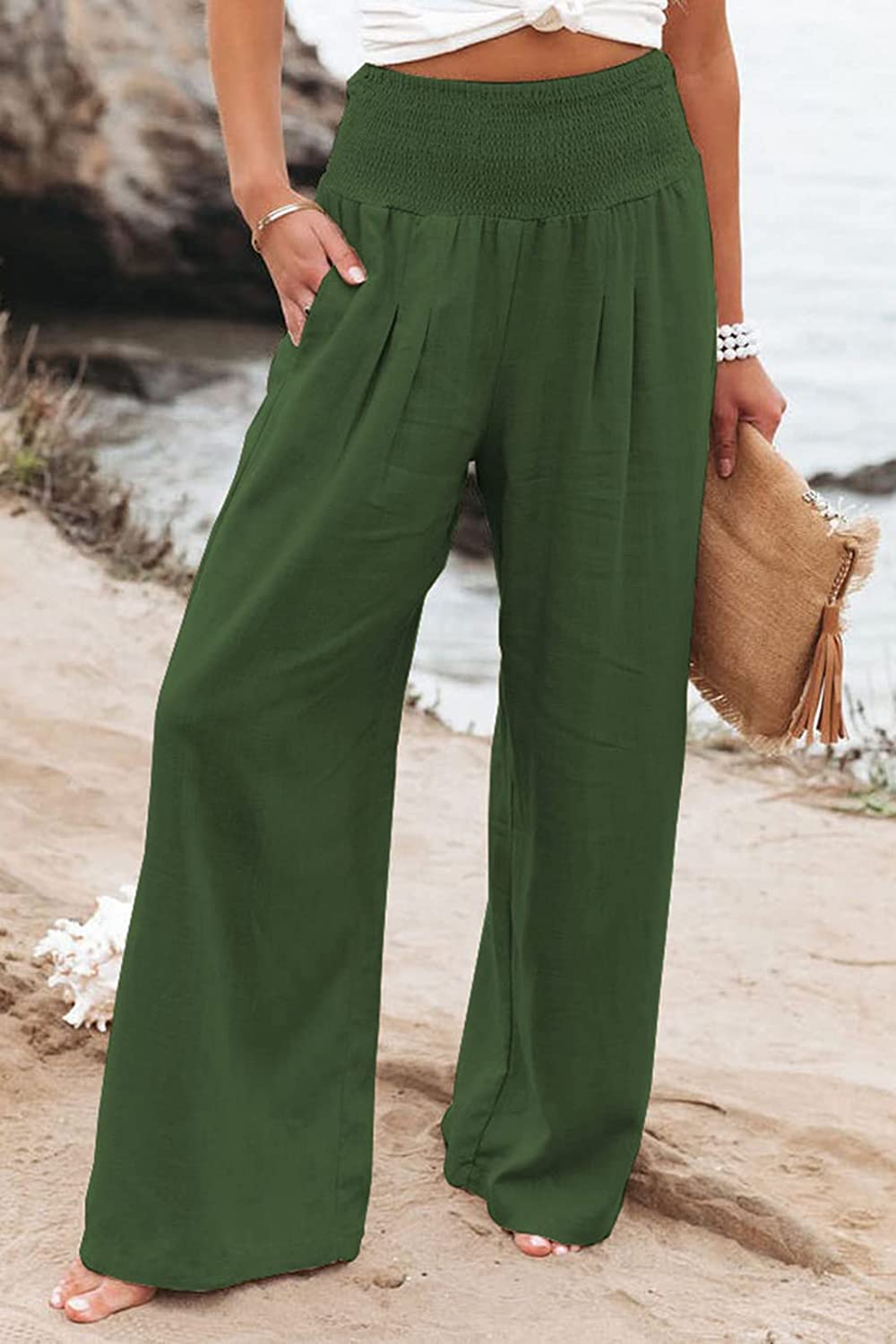 Pantaloni donna palazzo vita alta, tessuto fluido per la massima eleganza estiva.