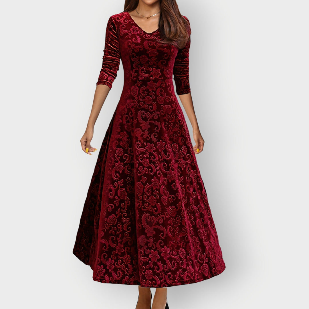 Abito midi donna elegante nero con scollo a V, svasato, perfetto per cerimonia o sera.
