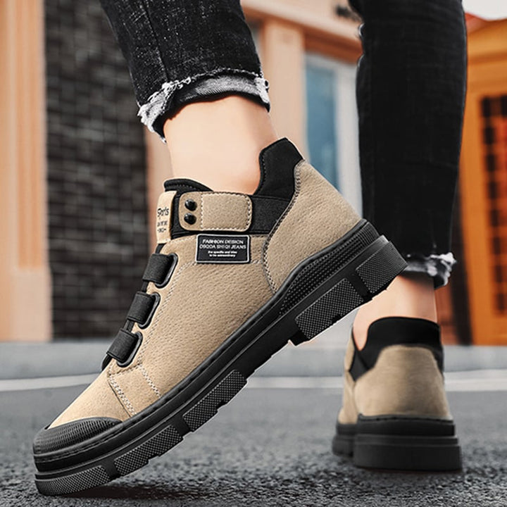 Moderne sneakers invernali uomo per streetwear, con fascia elastica e suola ammortizzata, perfette per look maschili.