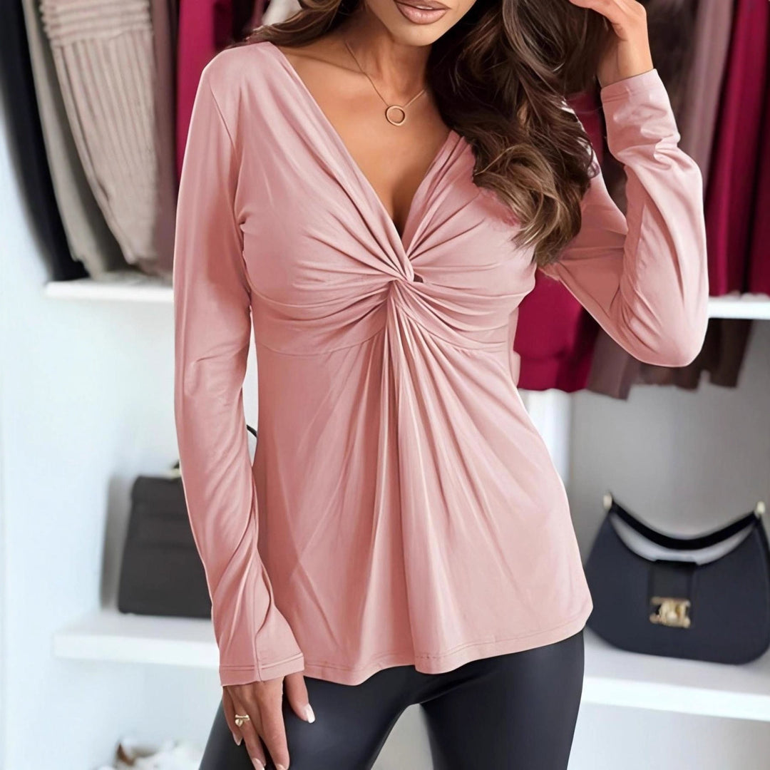 Top fluido nero donna, maniche lunghe, scollo a V. Abbigliamento femminile elegante per ogni occasione.