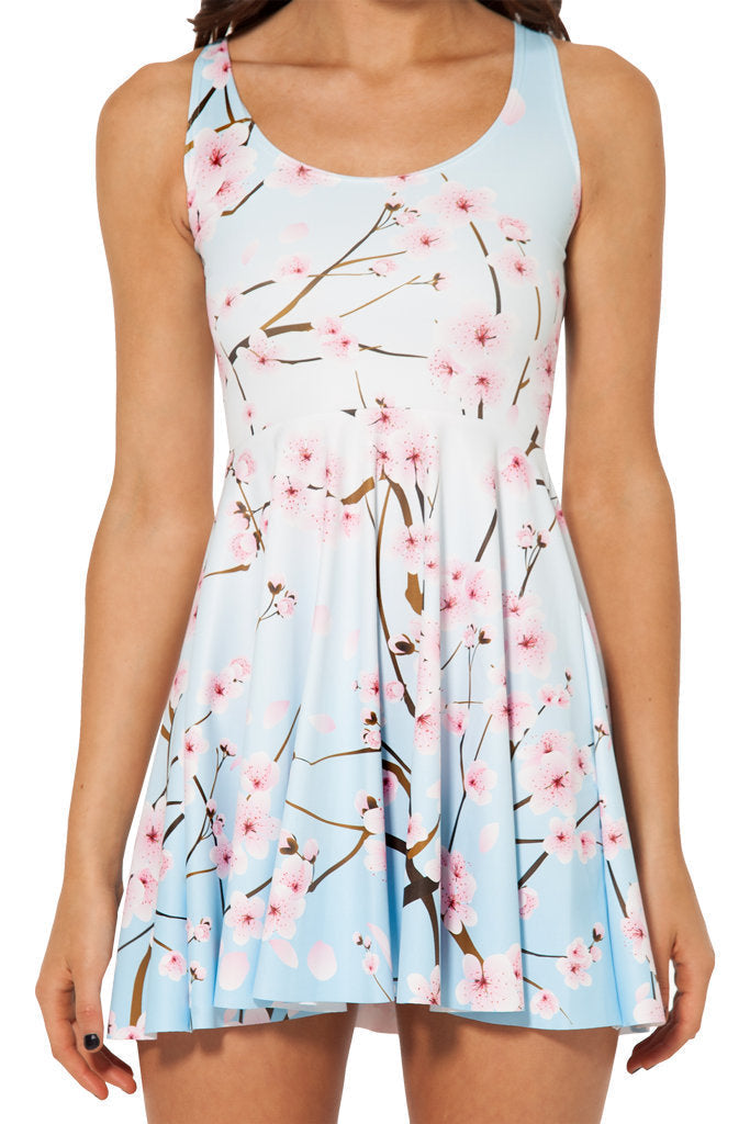 Elegante abito midi estivo donna con stampa geometrica, spalline sottili, per vacanze chic.