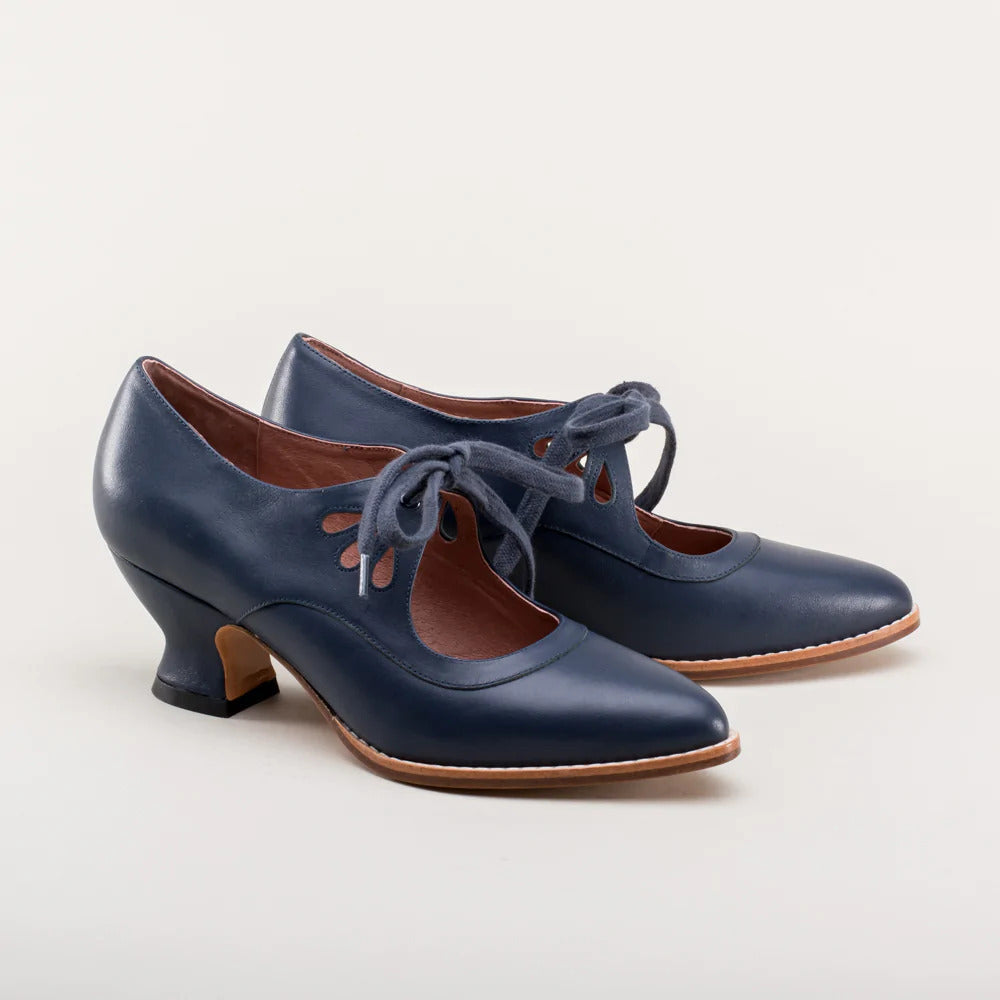 Scarpe donna nere con tacco, supporto arco plantare e suola antiscivolo. Perfette per eleganza e comfort.