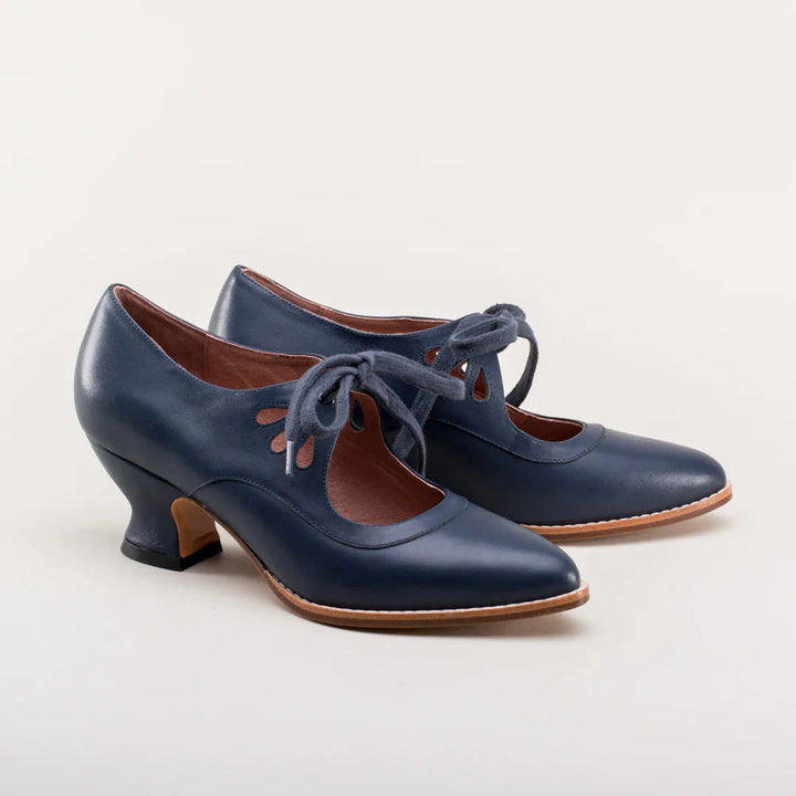 Scarpe donna nere con tacco, supporto arco plantare e suola antiscivolo. Perfette per eleganza e comfort.