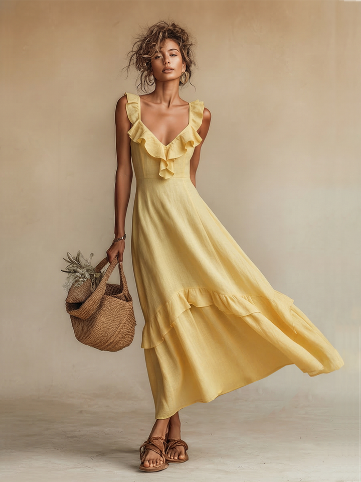 Elegante abito maxi estivo in lino giallo con scollo a V, perfetto per resort, spiaggia o look casual chic.
