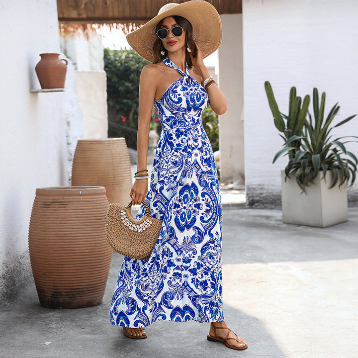 Abito donna midi estivo blu floreale, design A-linea a vita alta. Versatile per eventi eleganti o casual.