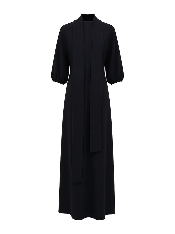 Vestito nero da cerimonia per donna, design chic con maniche a sbuffo e collo alto, disponibile in taglie forti.