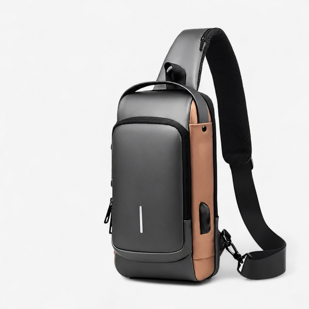 Borsa monospalla antifurto da uomo in sintetico. Accessorio elegante e robusto, essenziale per la sicurezza.