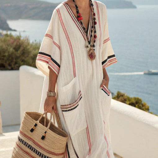 Abito caftano lungo bohemien da donna ricamato, ideale per spiaggia, vacanze estive o moda mare elegante.