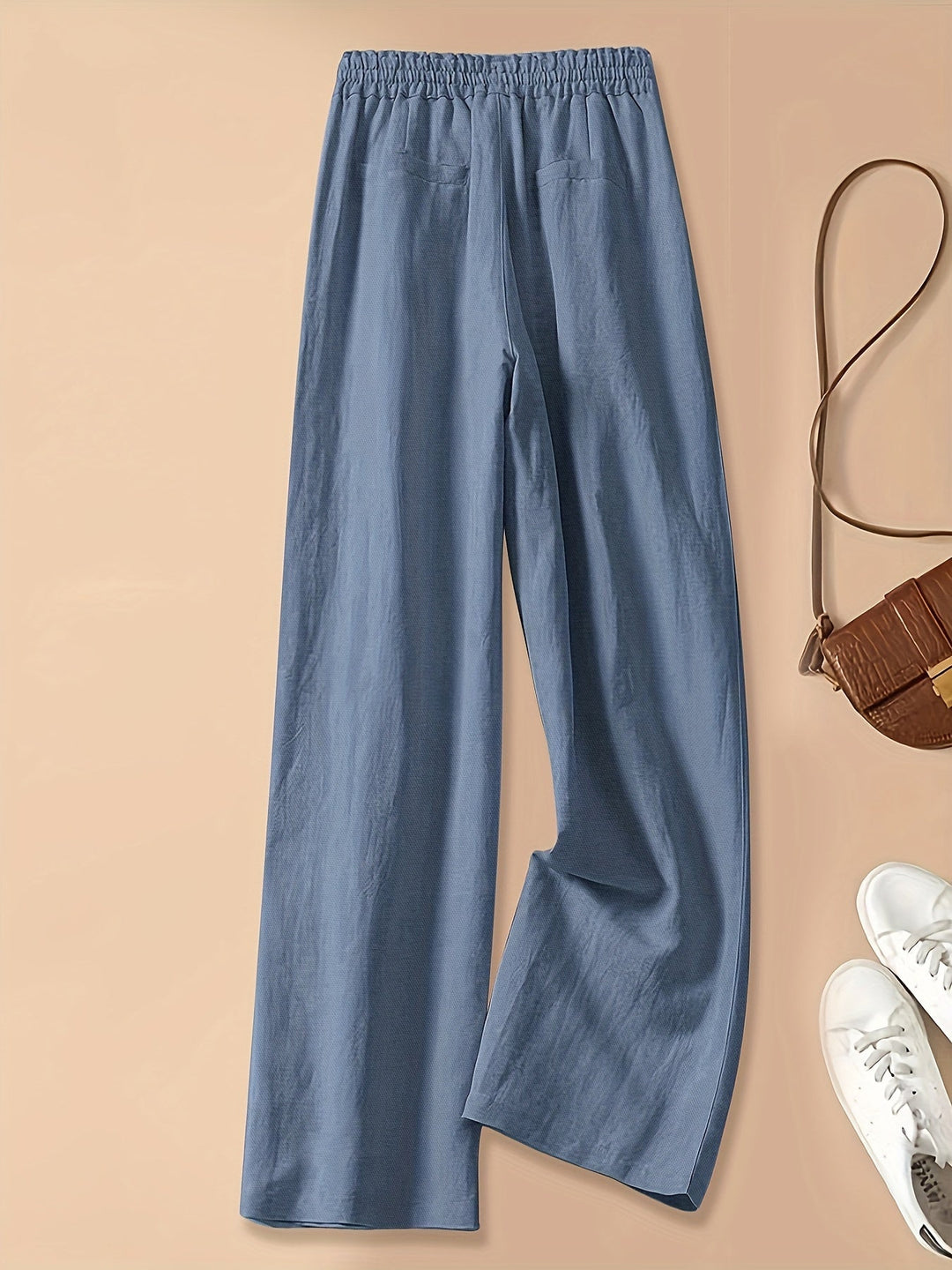 Outfit casual: pantaloni gialli donna a vita alta con coulisse, perfetti per un look estivo e chic.
