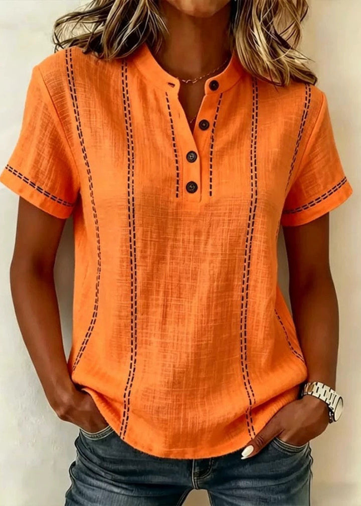 Blusa donna maniche corte, colletto coreano, stampa a righe. Comoda ed elegante per la primavera.