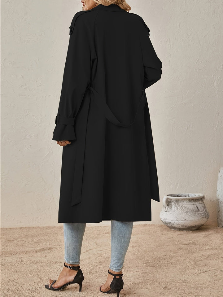 Trench lungo da donna, capospalla sofisticato per un look elegante e senza tempo in primavera e autunno.