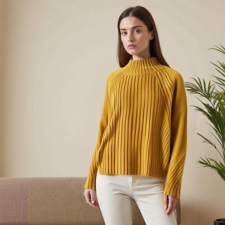 Maglione dolcevita donna a coste, morbido e caldo, perfetto per l'inverno elegante.