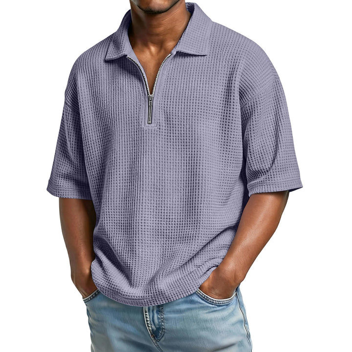 Polo uomo estiva in maglia a nido d'ape, vestibilità regolare. Perfetta per un look casual e confortevole.