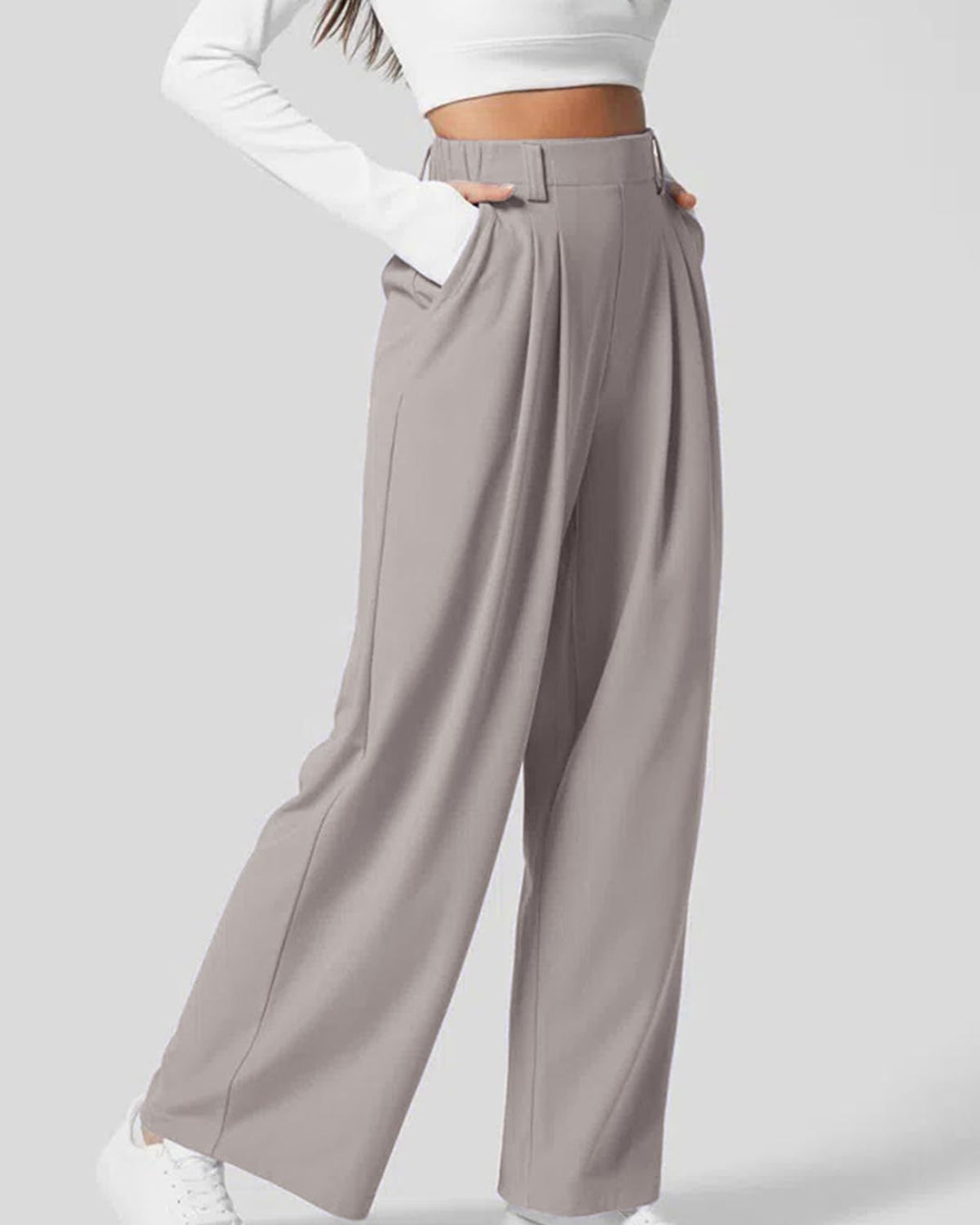 Pantaloni donna comodi a gamba ampia, vita alta, in tessuto waffle. Essenziali per un guardaroba moderno.