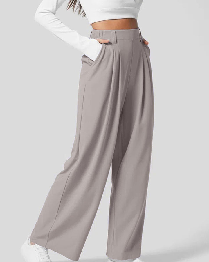 Pantaloni donna comodi a gamba ampia, vita alta, in tessuto waffle. Essenziali per un guardaroba moderno.
