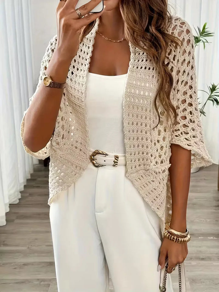 Cardigan donna aperto color beige, ideale per look primaverili, estivi e autunnali, un capo casual e chic.