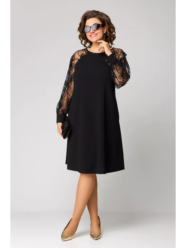 Vestito midi nero svasato per donna con maniche raffinate, ideale per un look formale in primavera.