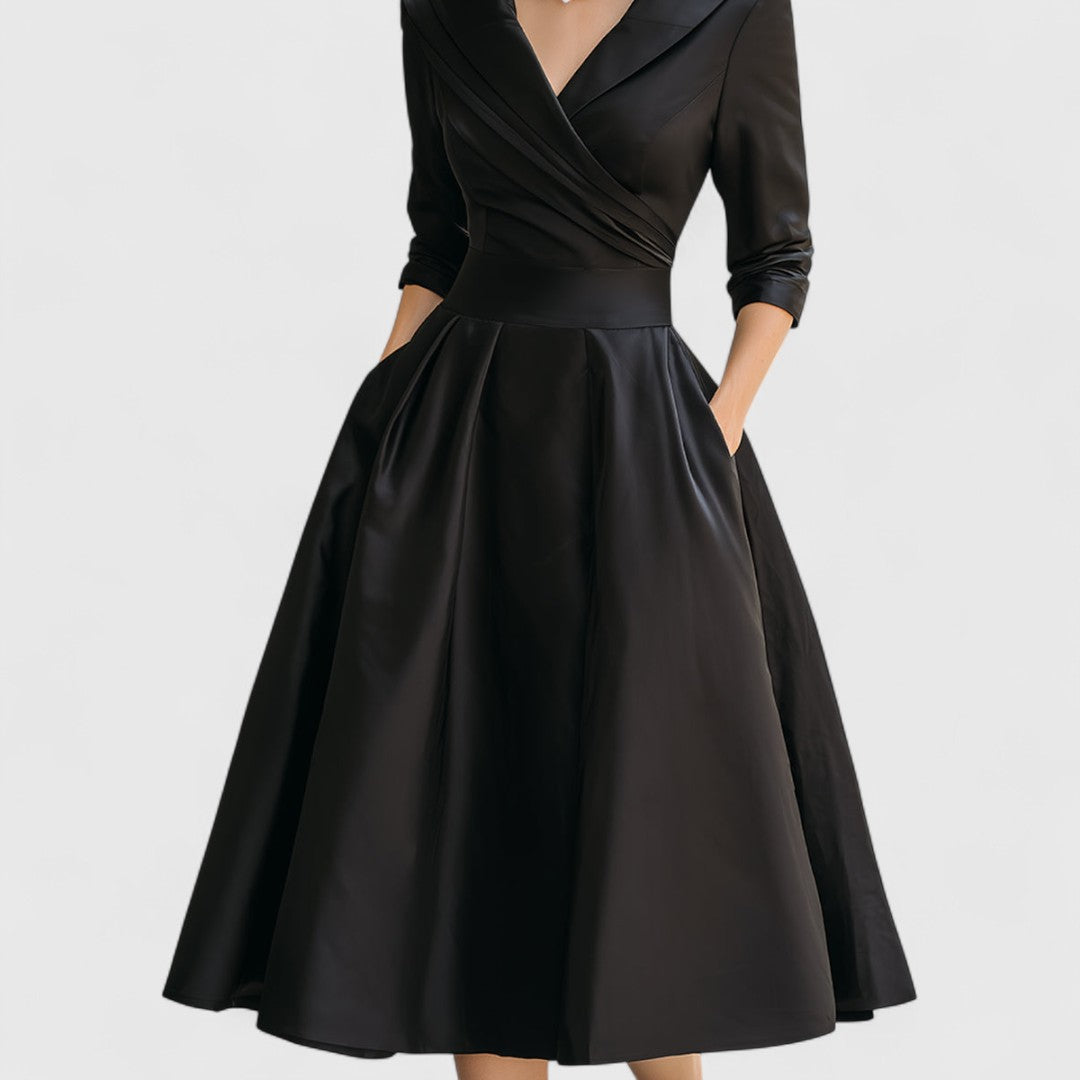 Confortevole abito midi donna con tasche e scollo a V, perfetto per uno stile casual-elegante.