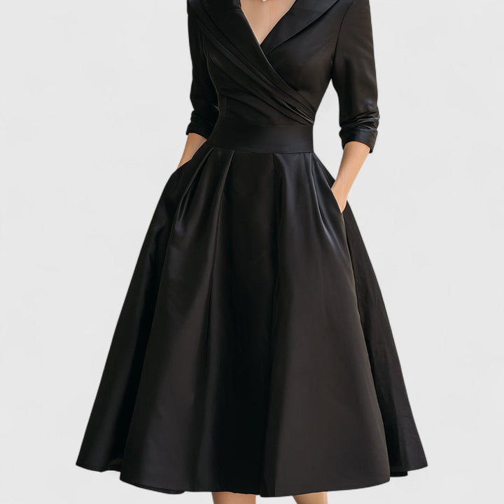 Confortevole abito midi donna con tasche e scollo a V, perfetto per uno stile casual-elegante.